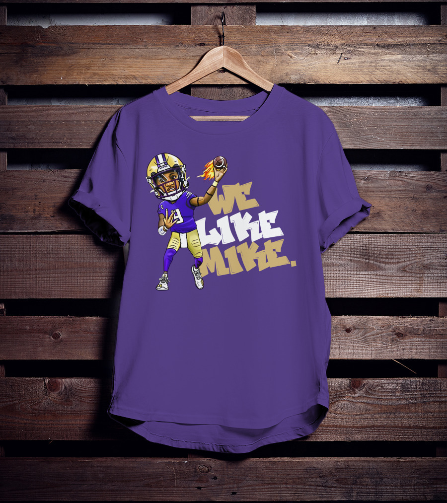 We Like Mike Football Character In Purple And Gold Gear Holding Flaming Ball T-Shirt