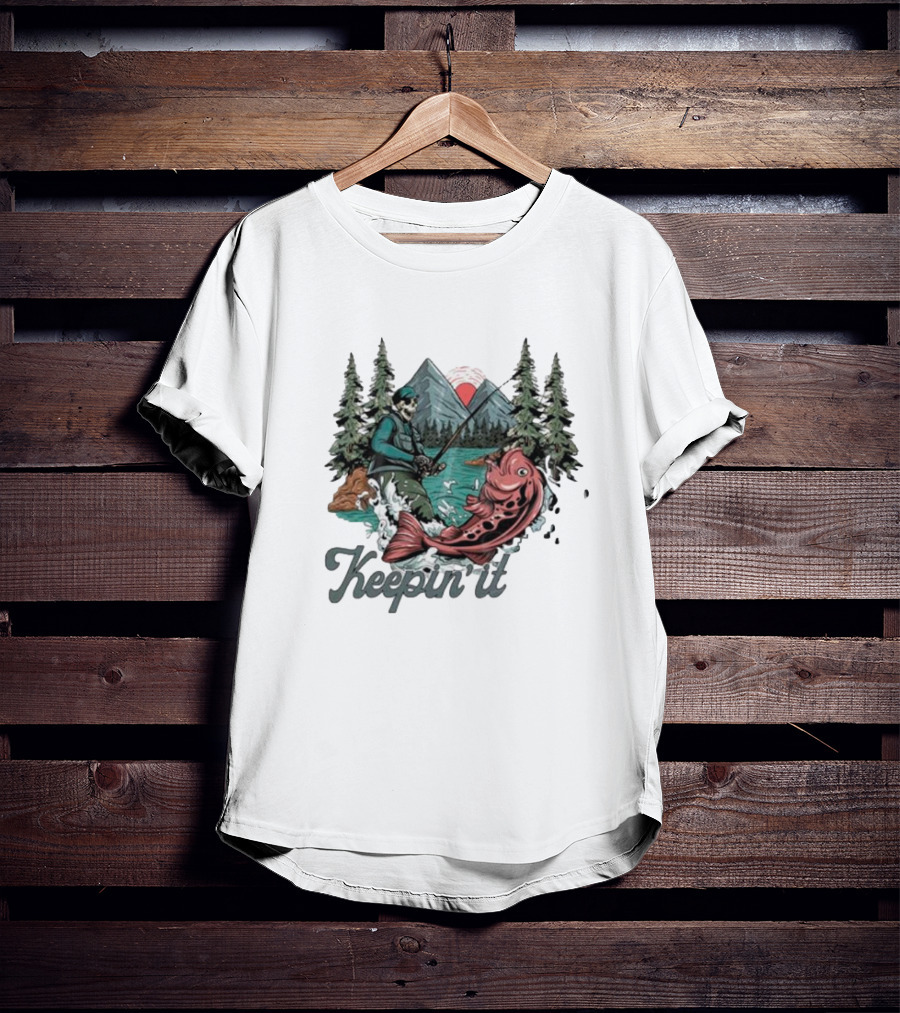 Keepin' It Reel Skeleton Fishing Adventure With Giant Fish And Mountain Lake Scene T-Shirt