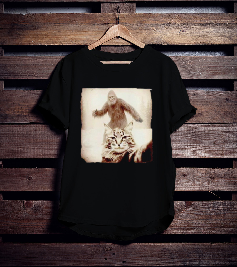 Cat Taking Selfie With Bigfoot In Snowy Forest Scene T-Shirt