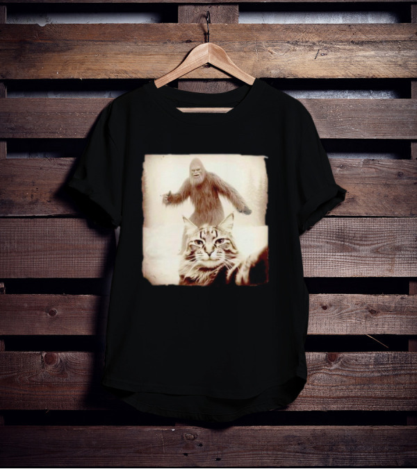 Cat Taking Selfie With Bigfoot In Snowy Forest Scene T-Shirt