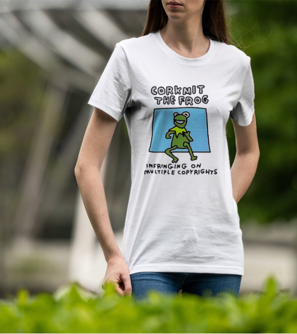 Corkmit The Frog Infringing On Multiple Copyrights Green Frog Cartoon With Blue Background T-Shirt