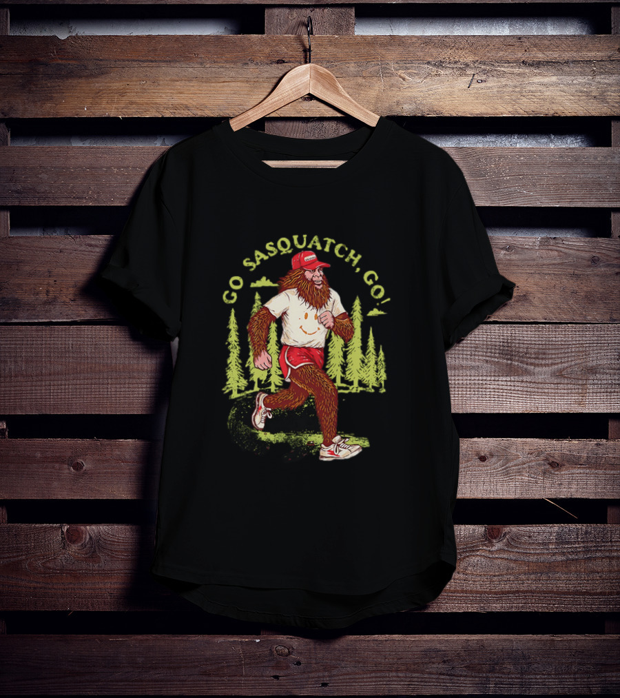 Go Sasquatch Go Bigfoot Jogging In Forest With Red Cap And Sneakers T-Shirt