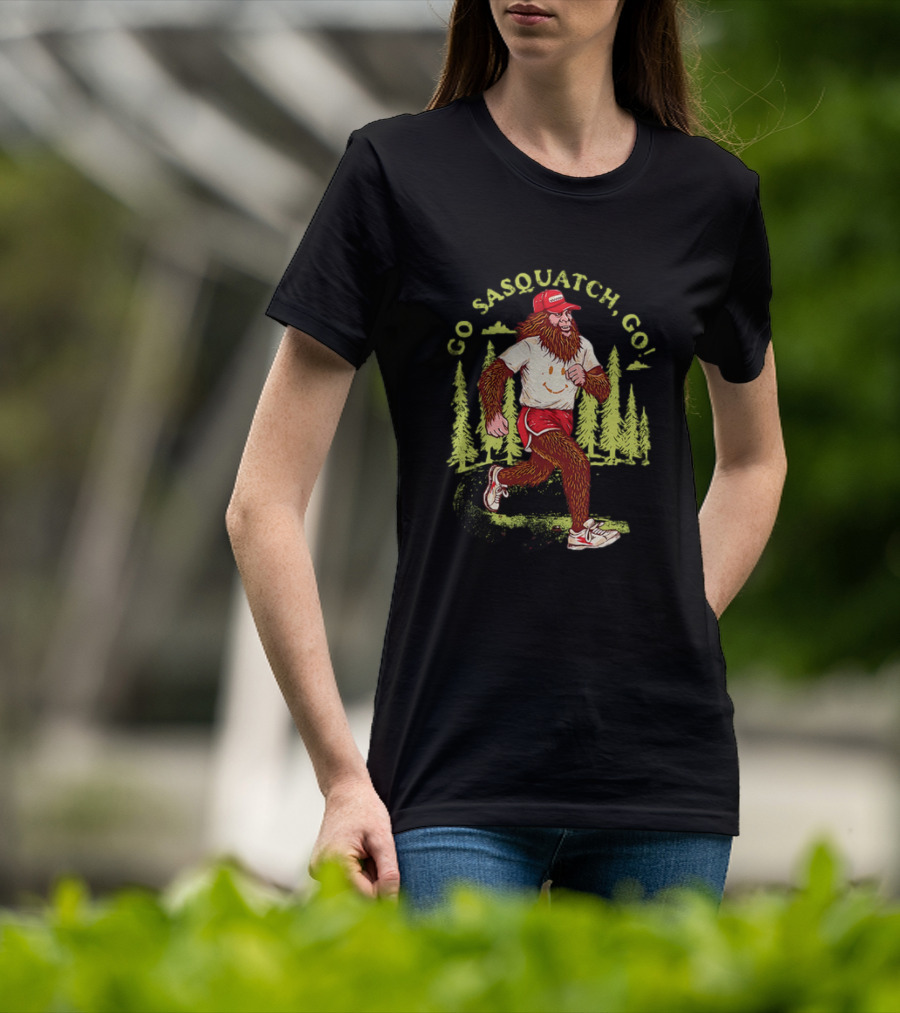 Go Sasquatch Go Bigfoot Jogging In Forest With Red Cap And Sneakers T-Shirt