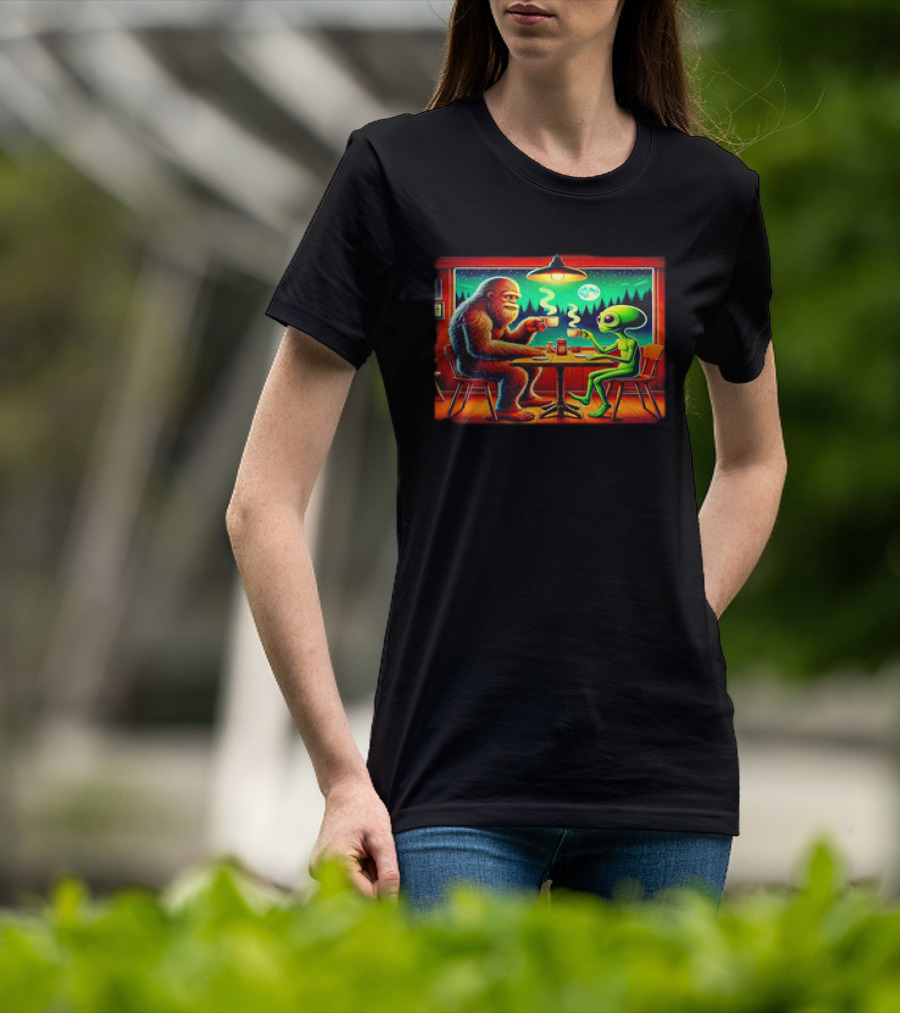 Bigfoot And Alien Coffee Meetup In Cabin At Night With Moonlit Forest T-Shirt