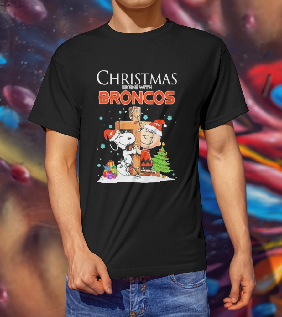 Christmas Begins With Broncos Charlie Brown Snoopy Hug Cross T-Shirt