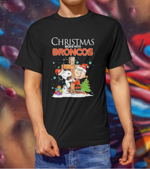 Christmas Begins With Broncos Charlie Brown Snoopy Hug Cross T-Shirt