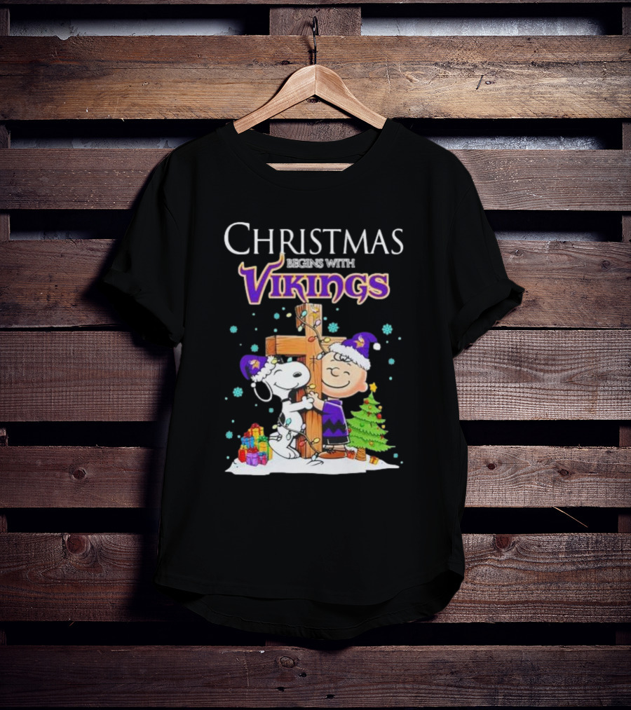 Christmas Begins With Minnesota Vikings Charlie Brown Snoopy Hug Cross T-Shirt