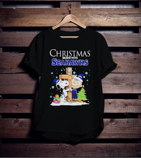 Christmas Begins With Seahawks Charlie Brown Snoopy Jesus Cross T-Shirt