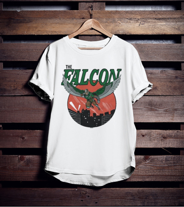 The Falcon Soaring Over City Skyline In Action-Packed Comic T-Shirt