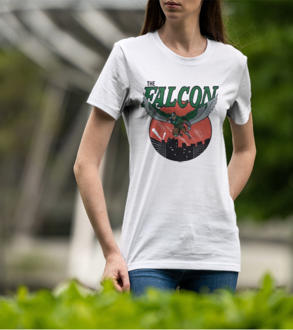 The Falcon Soaring Over City Skyline In Action-Packed Comic T-Shirt