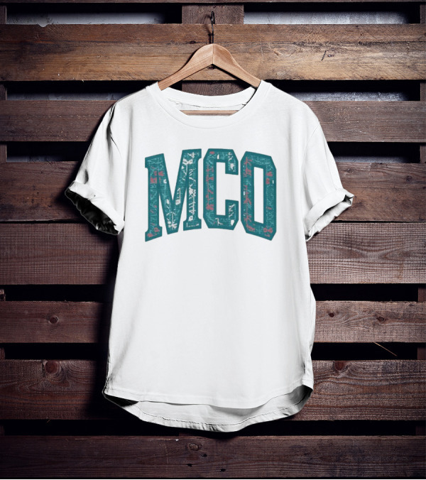 MCO Magic Carpet Oasis Vintage Teal Textured Letters T-Shirt