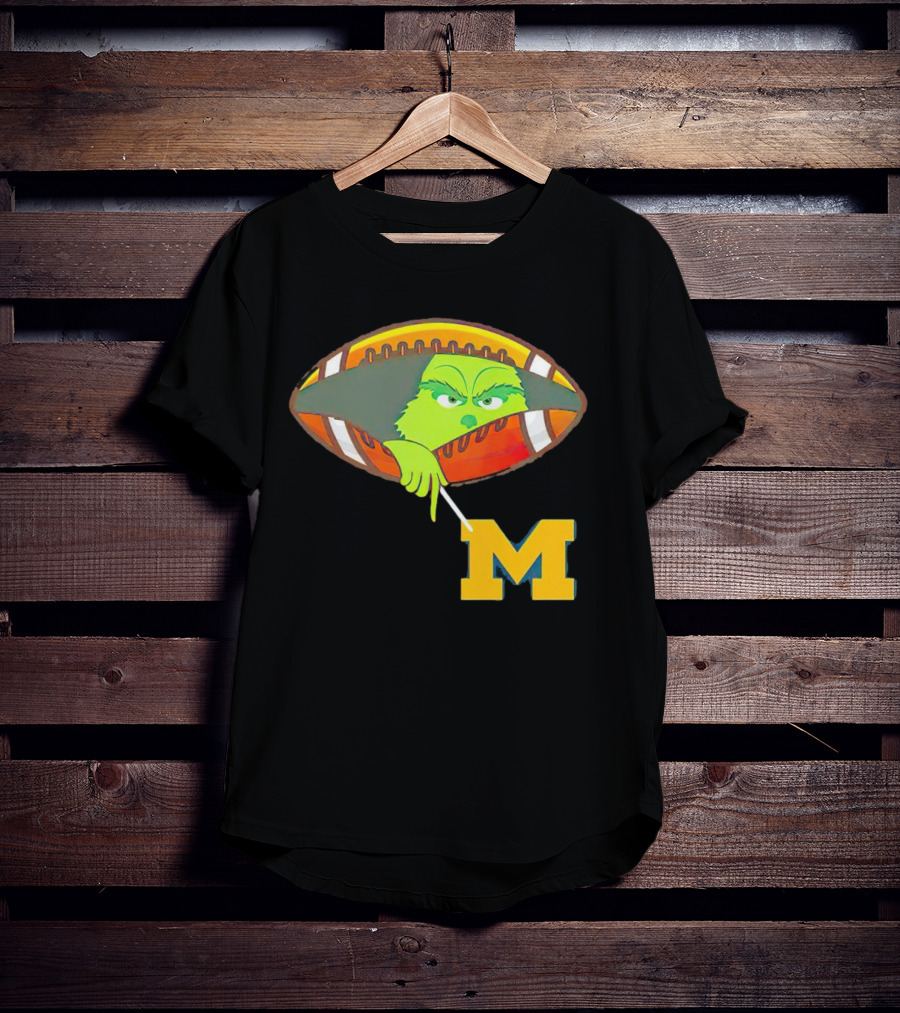 Grinch Peeking From Football Over Michigan Wolverines T-Shirt