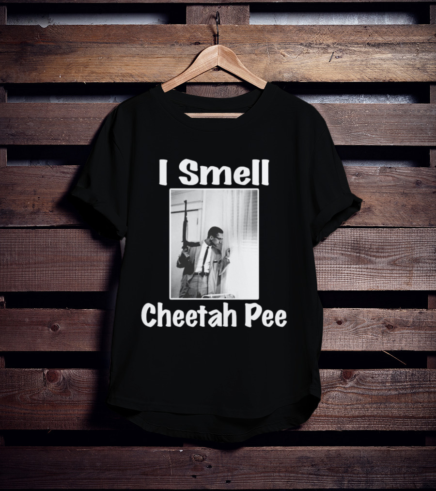 I Smell Cheetah Pee Man Holding Gun By Window T-Shirt