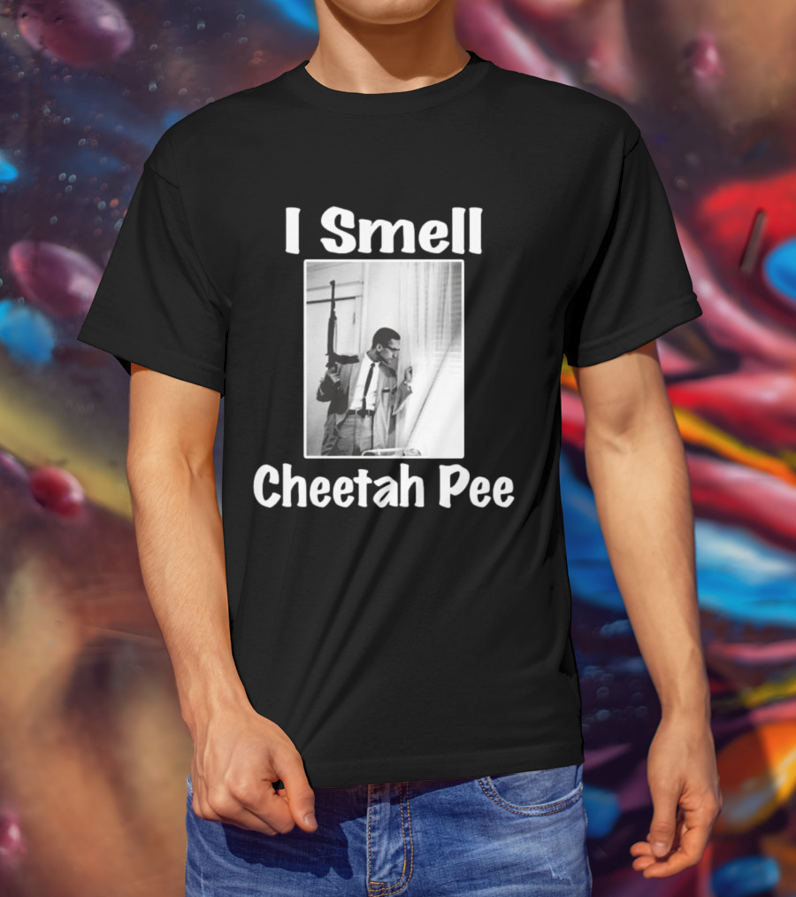 I Smell Cheetah Pee Man Holding Gun By Window T-Shirt