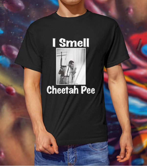 I Smell Cheetah Pee Man Holding Gun By Window T-Shirt