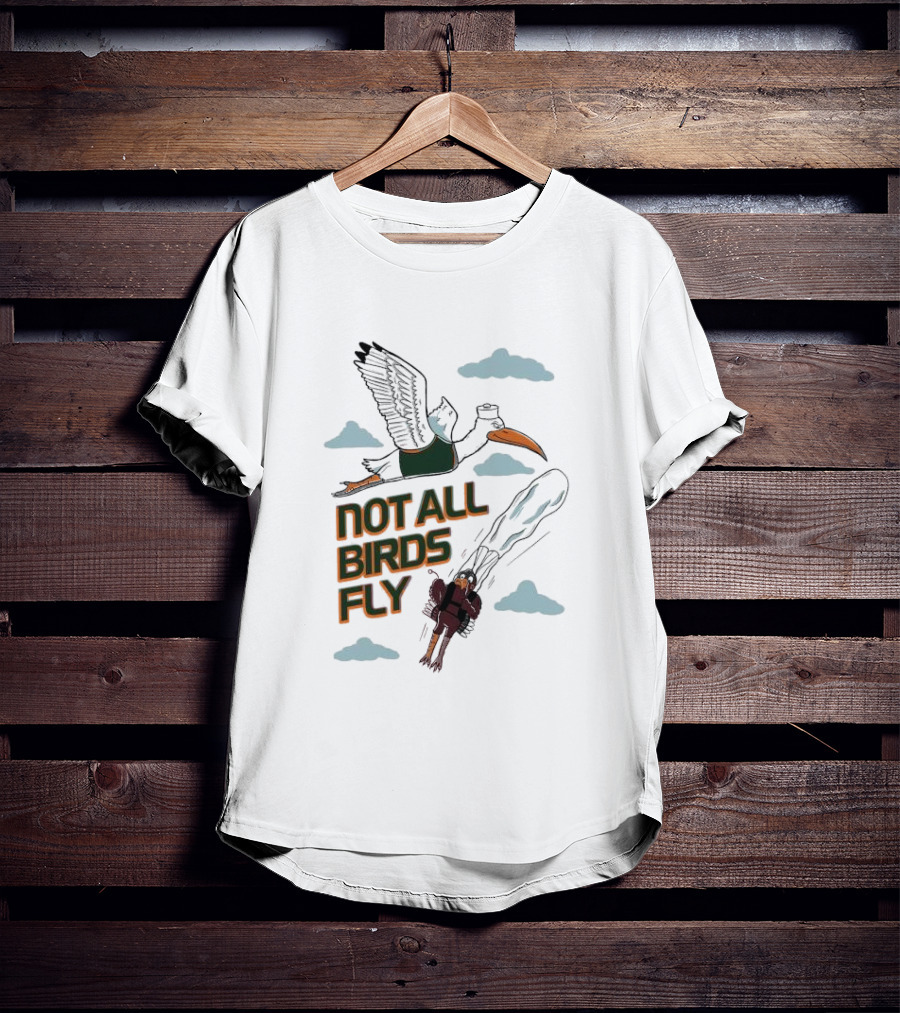Not All Birds Fly Funny Illustration With Flying Bird And Clouds T-Shirt