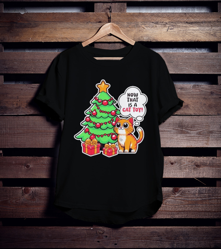 Now That Is A Cat Toy A Cute Orange Cat With Wide Eyes Next To Decorated Christmas Tree T-Shirt