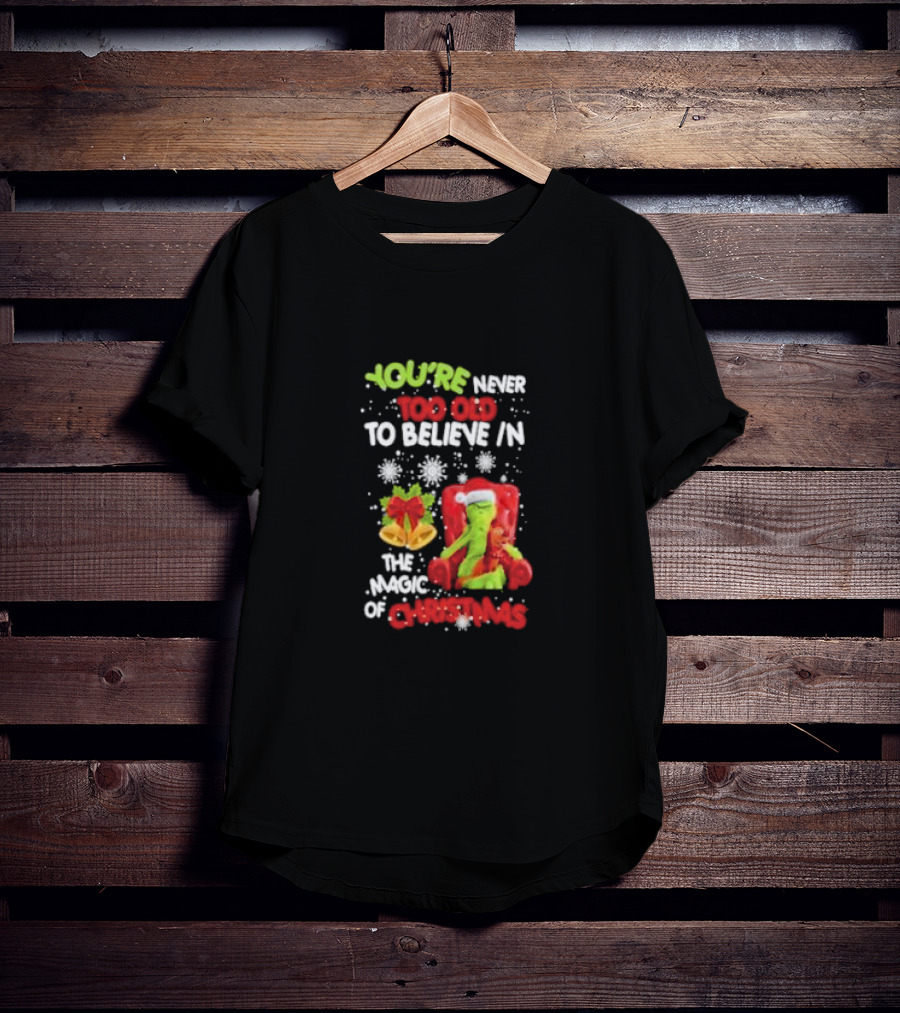 You're Never Too Old To Believe In The Magic Of Christmas With Santa Hat And Chair T-Shirt