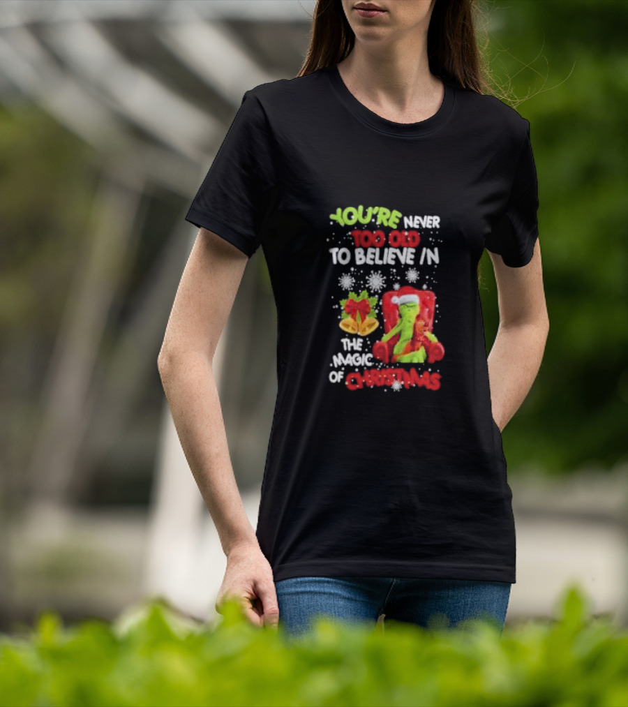 You're Never Too Old To Believe In The Magic Of Christmas With Santa Hat And Chair T-Shirt