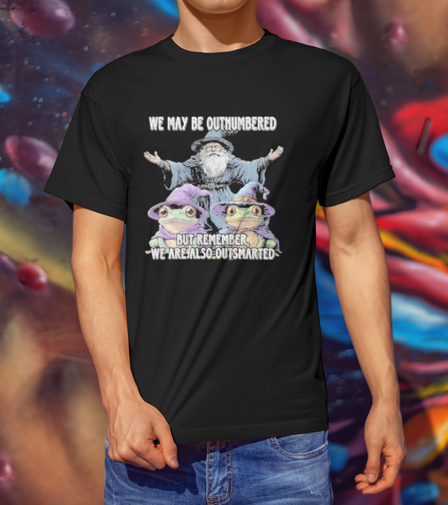 We May Be Outnumbered But Remember We Are Also Outsmarted Wizard And Frogs In Purple Hats T-Shirt