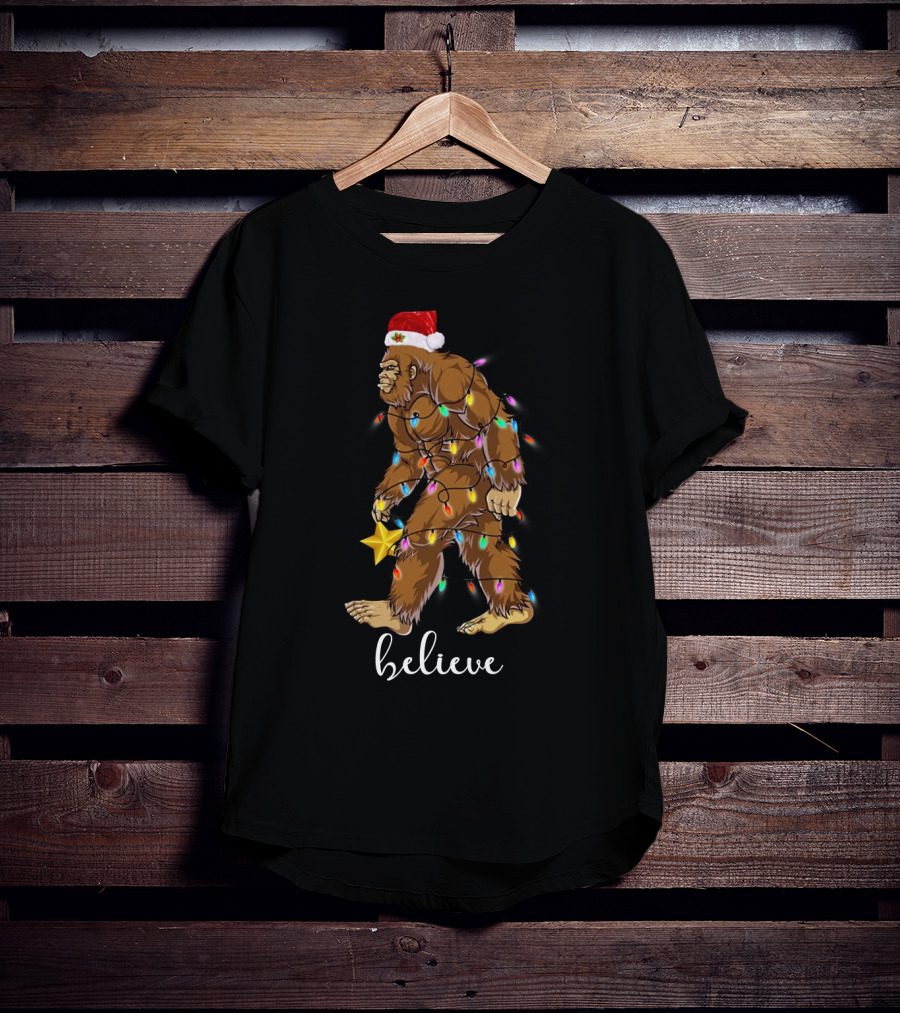 Bigfoot Christmas Lights Believe With Santa Hat And Star T-Shirt