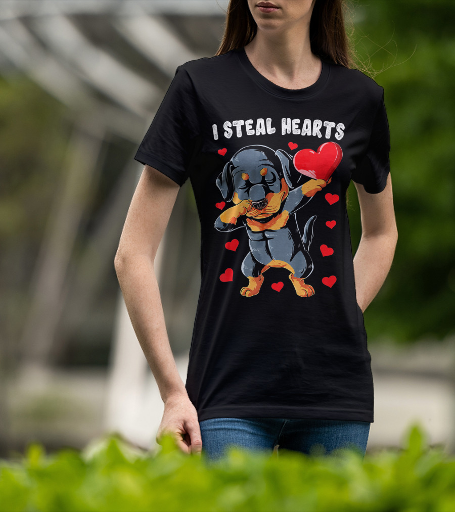 Dabbing Rottweiler Holding Heart Surrounded By I Steal Hearts Text T-Shirt