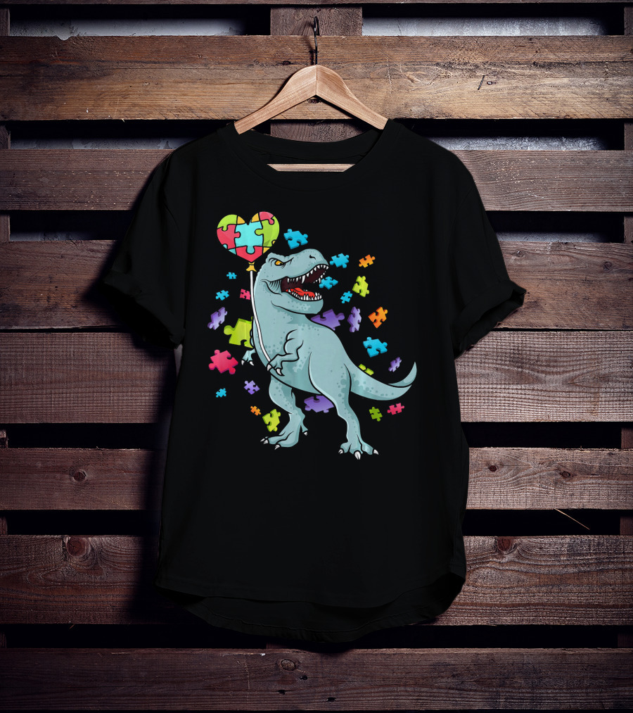 Autism Awareness Dinosaur With Puzzle Heart Balloon And Colorful Puzzle Pieces T-Shirt