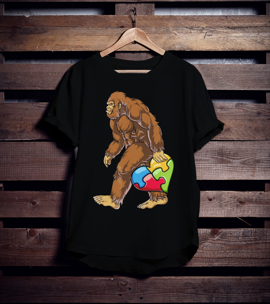 Bigfoot Holding Puzzle Piece Heart Autism Awareness T-Shirt