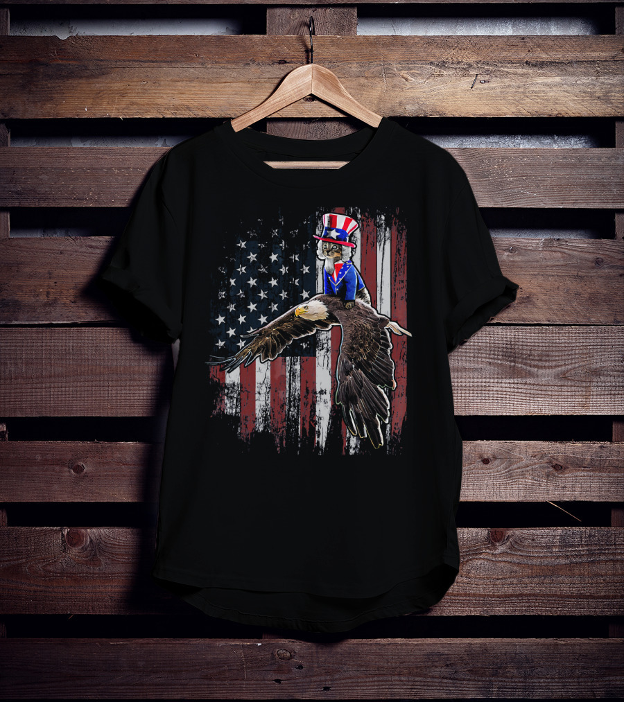 Uncle Sam Costume Cat Riding Bald Eagle On American Flag Background T-Shirt