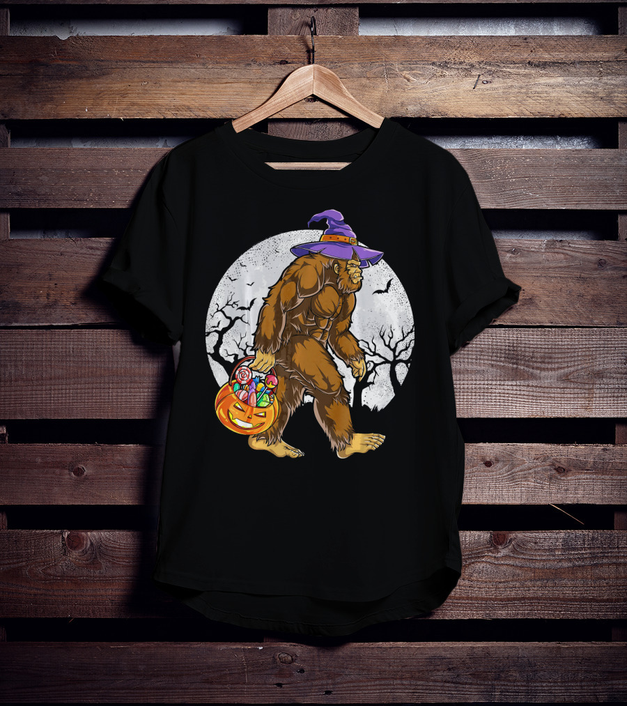 Bigfoot Witch Carrying Pumpkin Candy Basket In Spooky Moonlit Forest T-Shirt