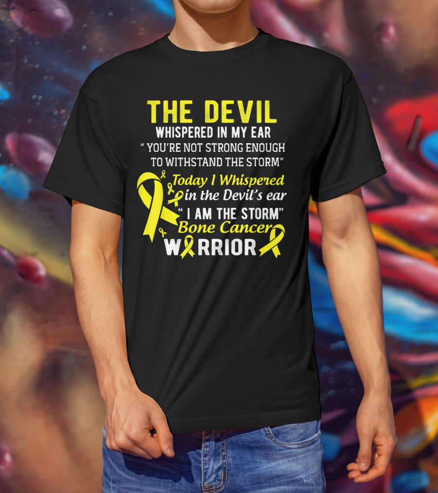 The Devil Whispered You’re Not Strong Enough To Withstand The Storm I Am The Storm Bone Cancer Warrior Yellow T-Shirt