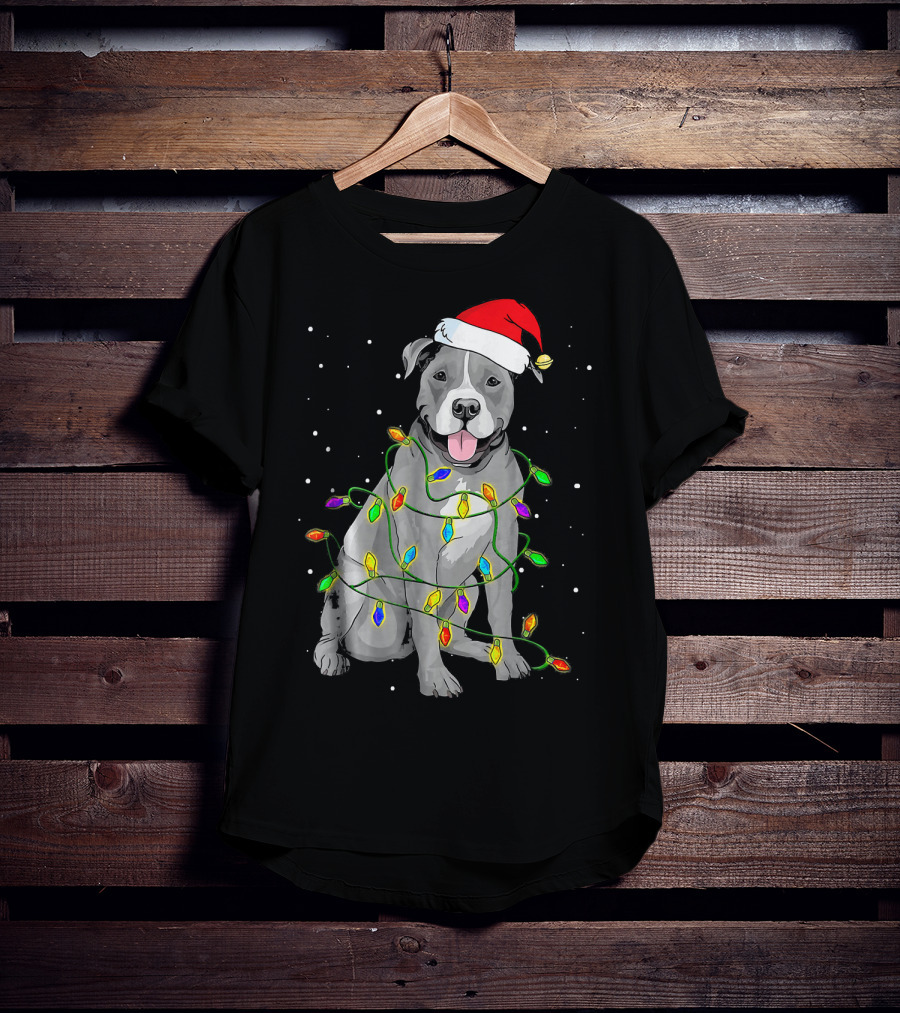 Pitbull In Santa Hat Wrapped In Christmas Lights With Snowy Background T-Shirt