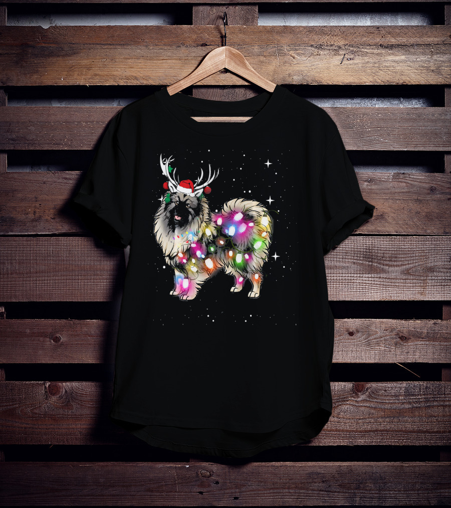 Keeshond Dog Wrapped In Christmas Lights Wearing Red Santa Hat And Antlers T-Shirt