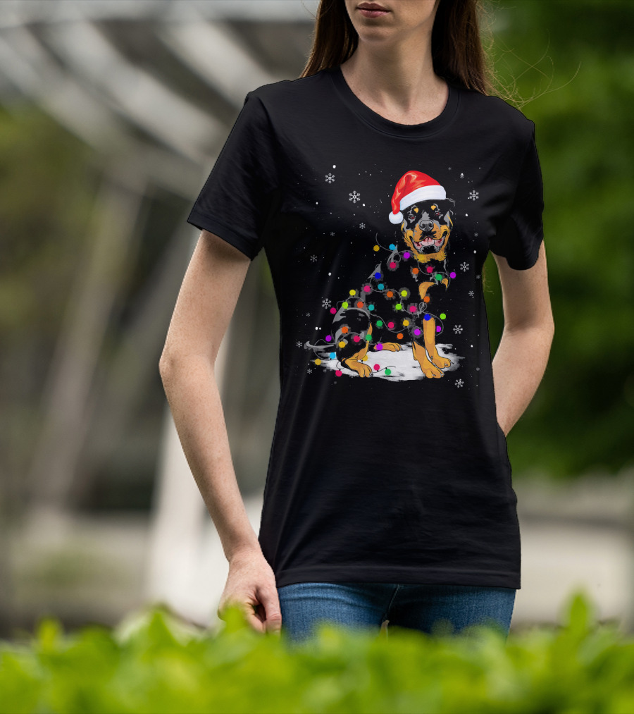 Rottweiler With Santa Hat And Colorful Christmas Lights In Snowy Scene T-Shirt