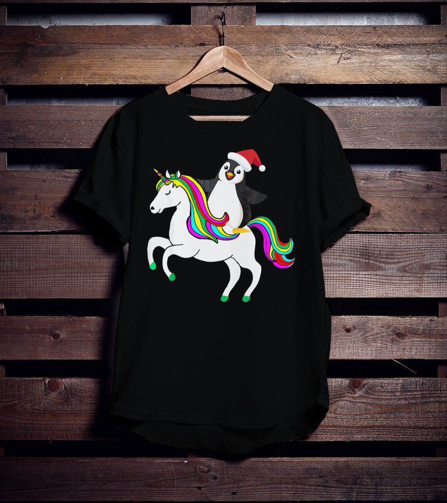 Penguin In Santa Hat Riding A Rainbow Unicorn T-Shirt
