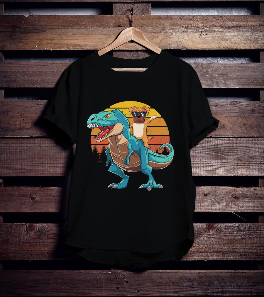 Boxer Dog With Sunglasses Riding Blue T-Rex Against Sunset Background T-Shirt